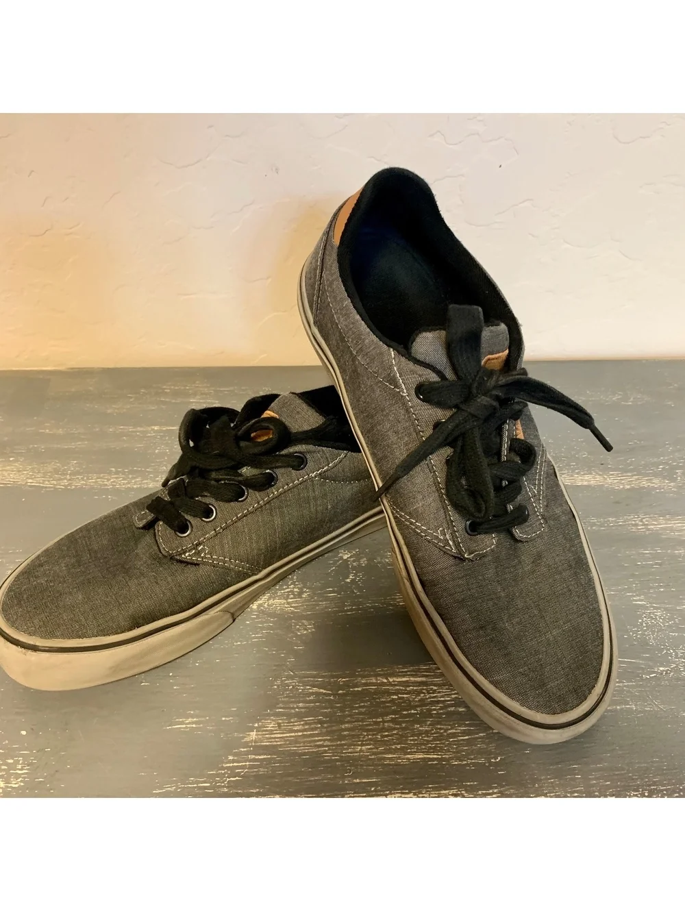 Gray low top lace-up sneakers
